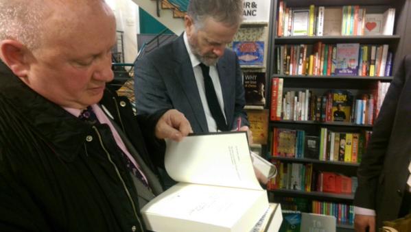 Maurice Walsh signing copies of Bitter Freedom at the launch in Dublin